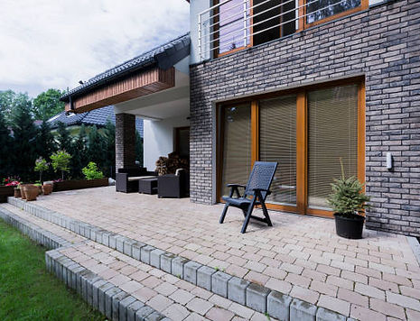 gray Raised Patio Running bond pavers with pavers
