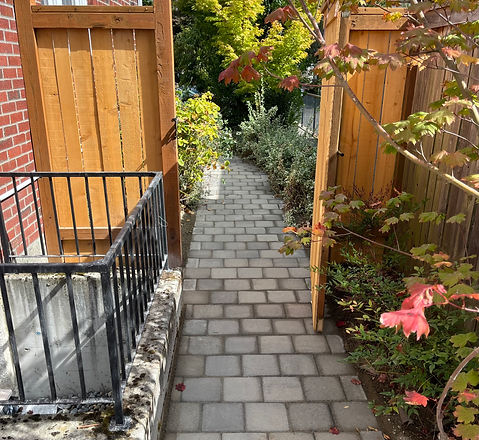 Running bond cascade blend double holland paver walkway fence