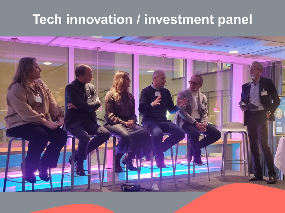 Five people (two women and three men) sitting on bar stools on a stage. One man in a suit standing to the right, holding some notes in his hand. Heading above saying "Tech innovation / investment panel". Red wave pattern at the bottom.