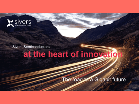 A lit up road (long exposure of lights) between two dark mountains. Message says "Sivers Semiconductors - at the heart of innovation. The road to a Gigabit future". Sivers Semiconductors logo at the upper left corner of image.