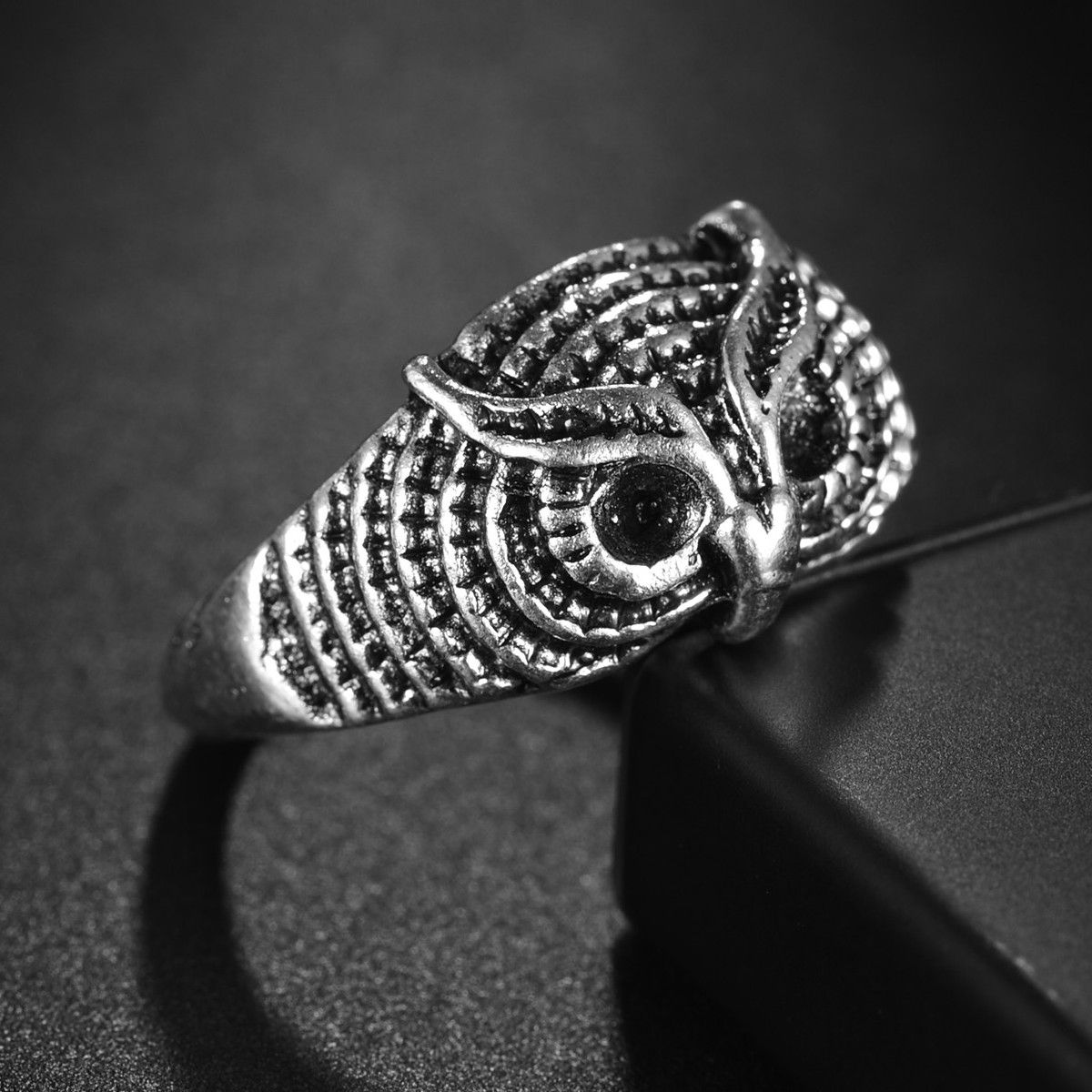 ANEL DE AÇO OLHOS DE CORUJA AJUSTÁVEL