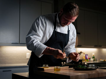 A chef preparing a meal.