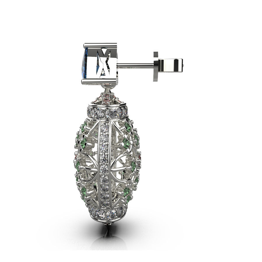 Thumbnail: “Side profile of an elaborate silver drop earring showing an oval filigree cage set with small green gemstones, diamond-studd