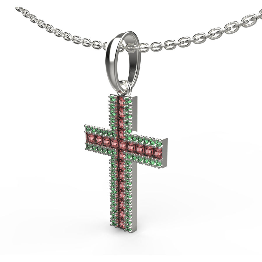 Thumbnail: Side-angle view of a silver cross pendant with red CZ center stones and green CZ border stones on a silver chain