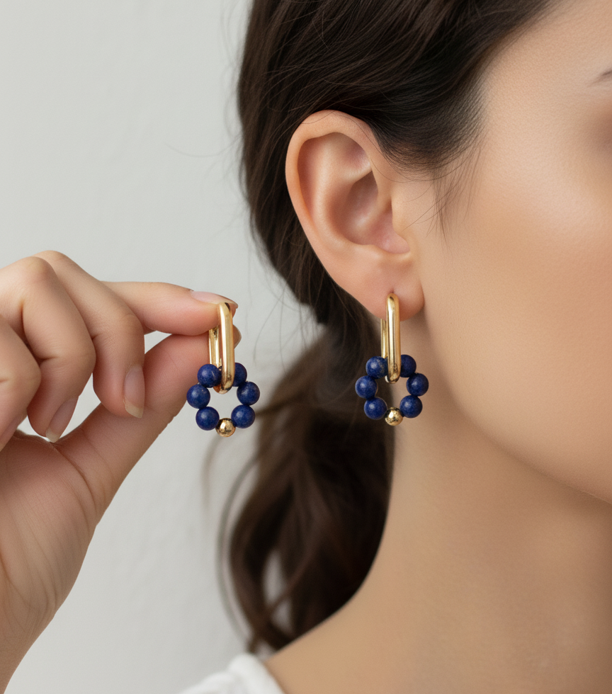 Model wearing the Moonspell Lapis Lazuli demi fine jewelry hoop earring