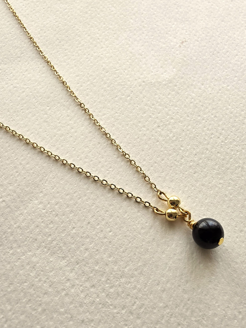 Minimal Black Tourmaline necklace for protection and grounding by Moon's Tribe