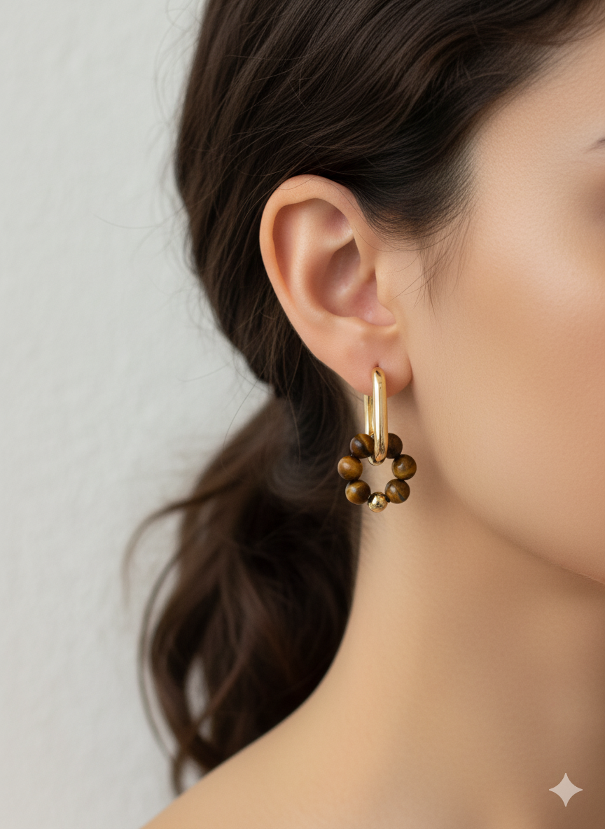 Model wearing the Moonspell Tiger's Eye demi fine jewelry hoop earring
