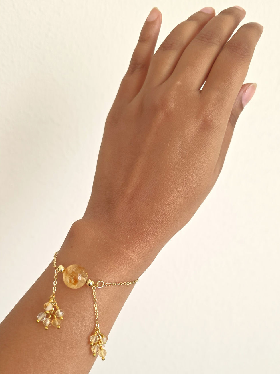 Moon’s Tribe Citrine bracelet featuring a round Citrine and gold-tone chain details.