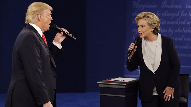 President-elect Donald Trump and Hillary Clinton debate in St. Louis on Oct. 9. The CIA has concluded that the Russians sought to tip the advantage in Trump's favor, a finding that Trump has dismissed. John Locher/AP