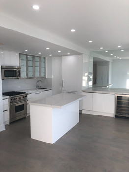Custom kitchen with modern cabinets, stylish urban pendant lighting, and premium finishes—renovation by NS Renovation’s handyman services in Central Texas