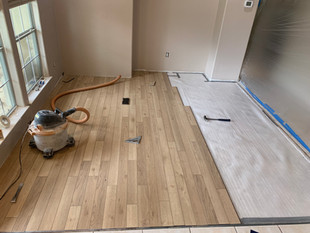 Newly installed or repaired flooring in a home, showcasing high-quality craftsmanship by NS Renovation’s handyman services in Central Texas