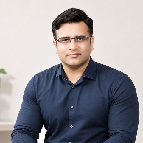 Professional headshot of enterprise content writer and B2B SEO strategist Abhishek Chattopadhyay wearing a dark blue button-up shirt.