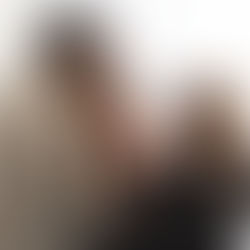 Behind the scenes of photographer Meagan Paige Photography posing a mom and dad with their newborn twins