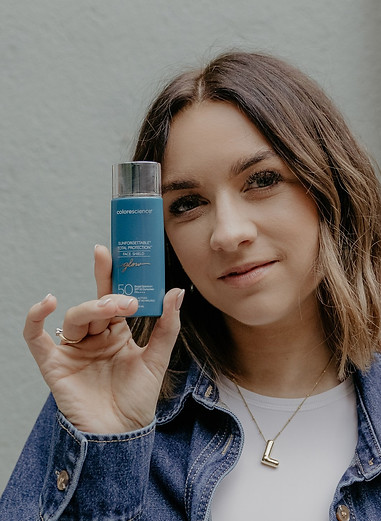 A skin health specialist analyzing bloodwork results to create a personalized skincare plan