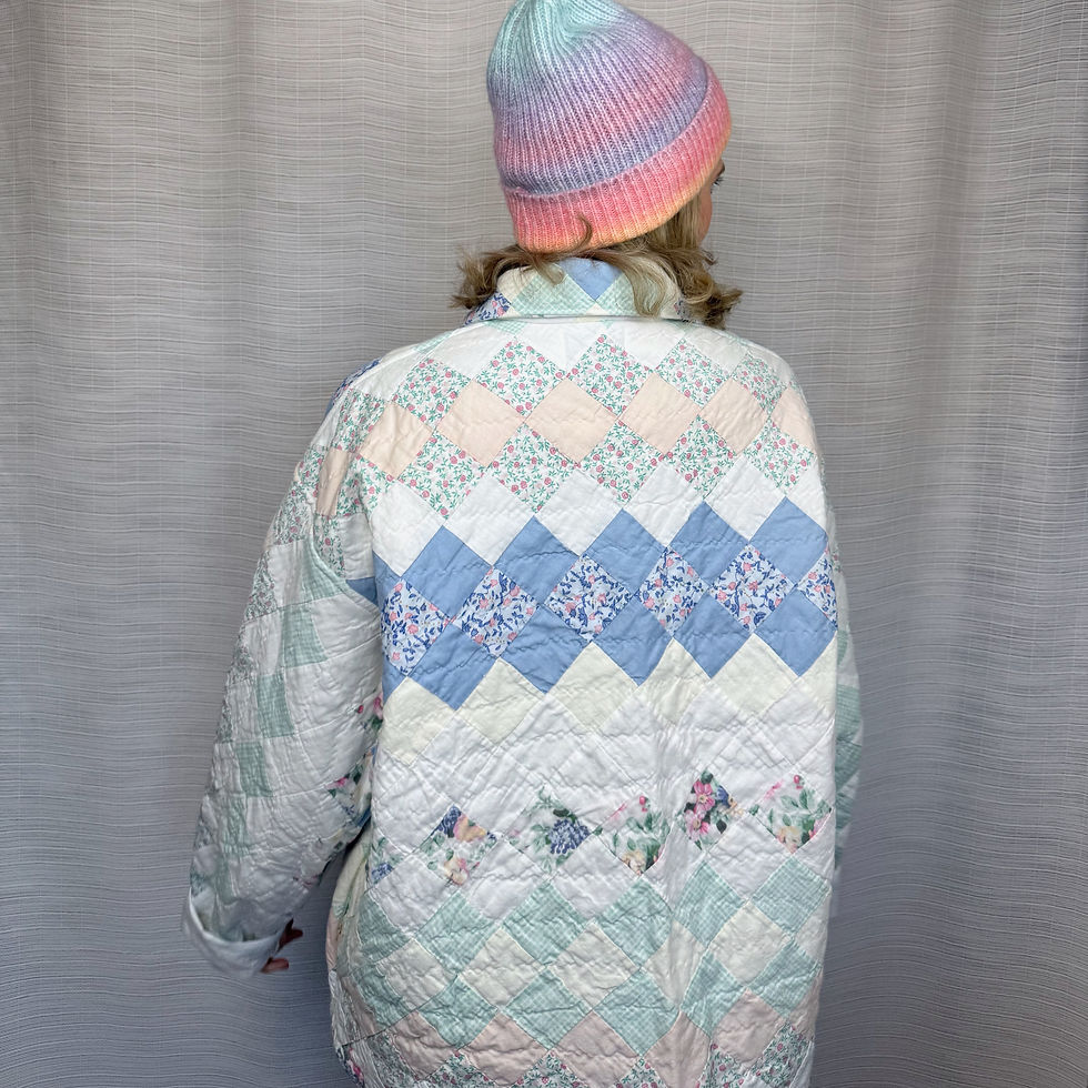 Thumbnail: Back view of upcycled pastel patchwork quilted jacket (XL)