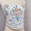 Thumbnail: Close-up of floral embroidery and bow on corset crop top