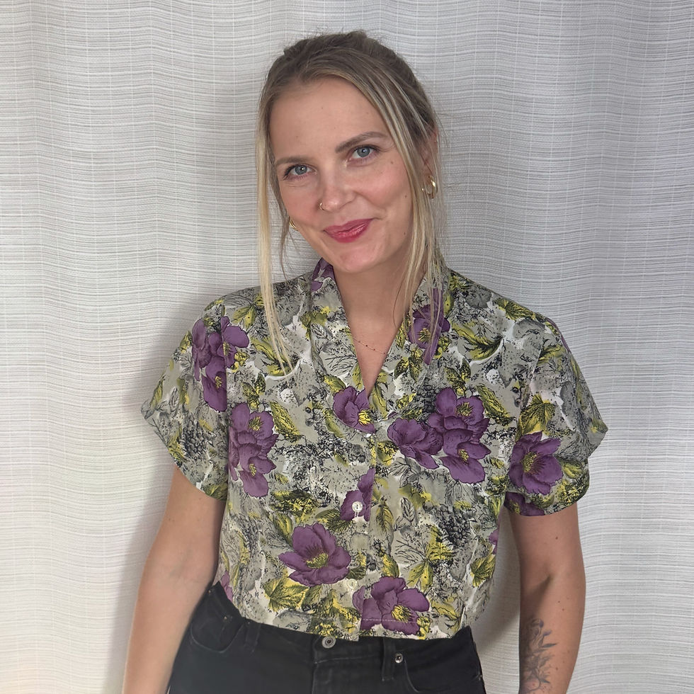 Upcycled gray floral cropped shirt with purple flowers and yellow leaves, front view on model (M)