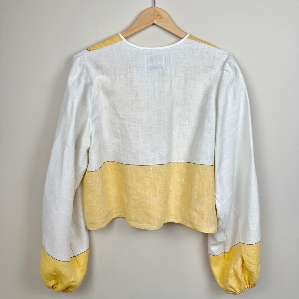 Thumbnail: Back view of upcycled linen colorblock top with white upper panel and yellow lower section.