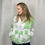 Thumbnail: Upcycled green gingham quilted jacket with embroidery and snap buttons, front on model
