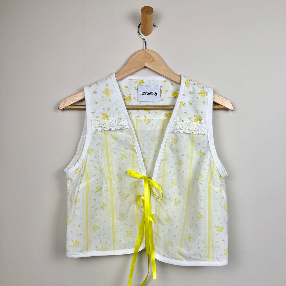 Upcycled yellow floral vest-style top with satin ribbon tie