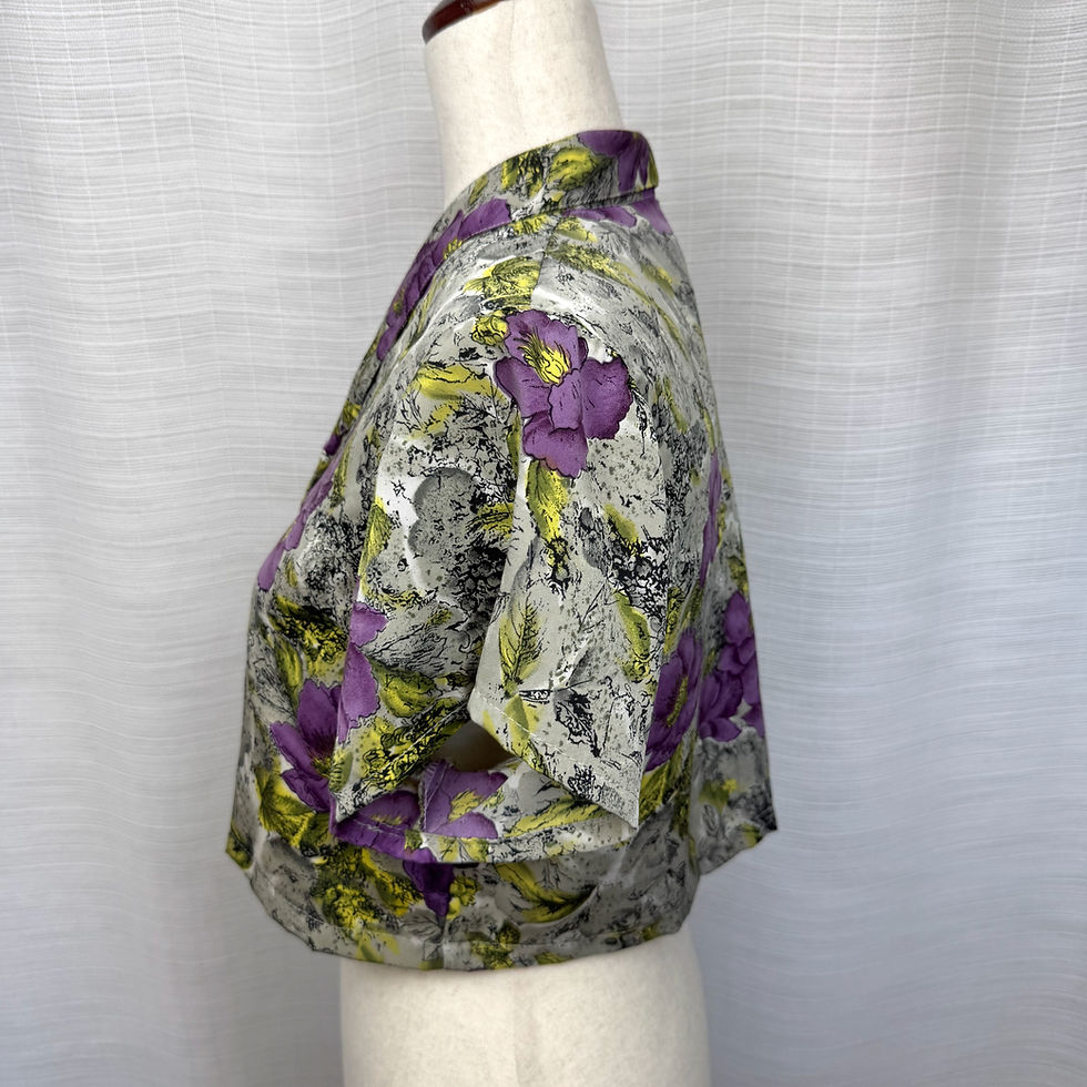 Thumbnail: Side view of vintage floral cropped shirt showing lightweight drape