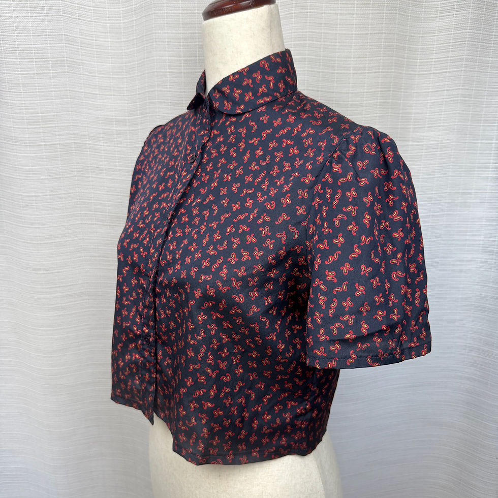 Thumbnail: Side view of upcycled cropped shirt showing short sleeves and collar detail