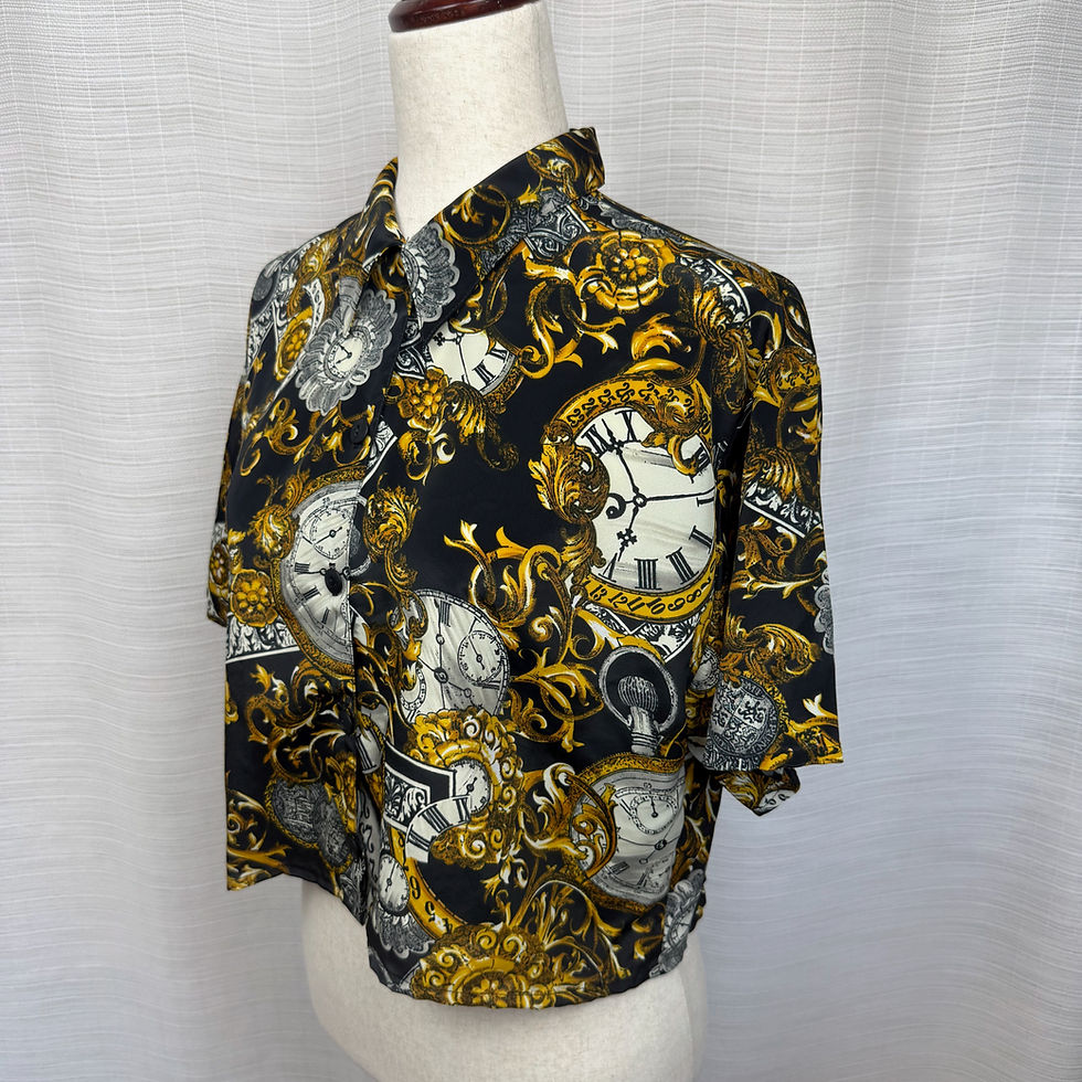 Thumbnail: Side angle of upcycled Petite Impressions cropped shirt showing gold clock pattern