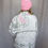 Thumbnail: Back view of upcycled floral quilted jacket showing embroidered panel
