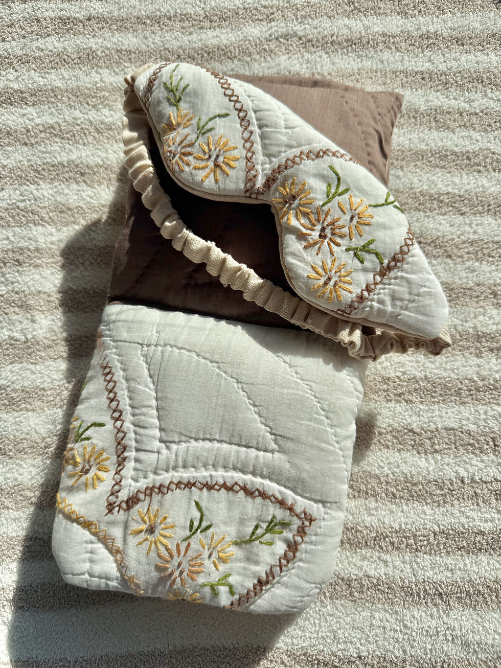Thumbnail: Side view highlighting the clean construction and soft layers of the upcycled textile wrap.