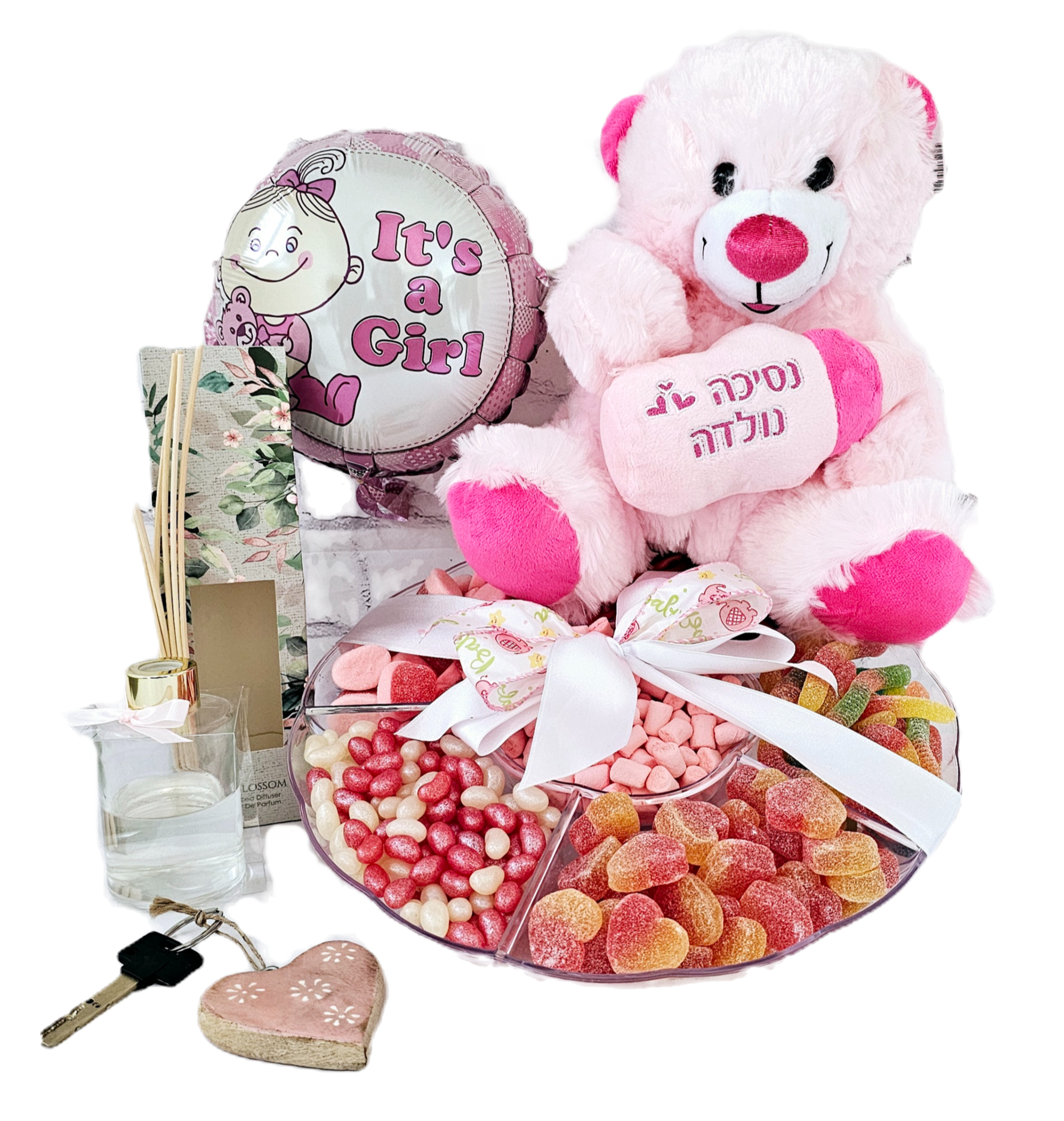 Gift arrangement in pink for a new baby girl, including a large divided candy platter, a large plush bear, scent diffuser, 9 inch air filled balloon, and pink heart-shaped key chain