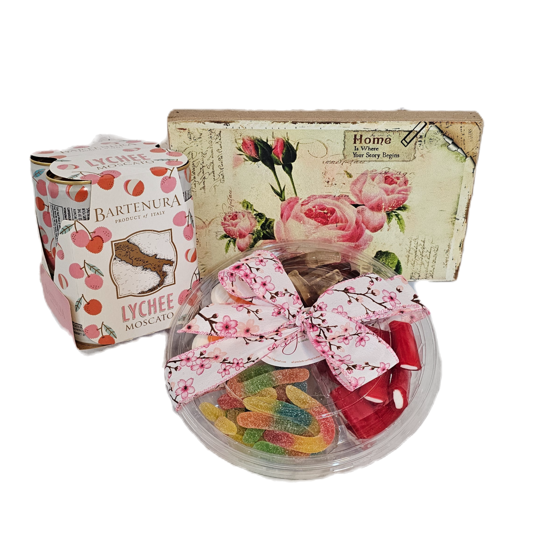 Gift collection including a sectional tray filled with candy, a set of four cans of Moscato wine, and a decorative home plaque