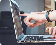 Some pointing at a screen for a digital brochure