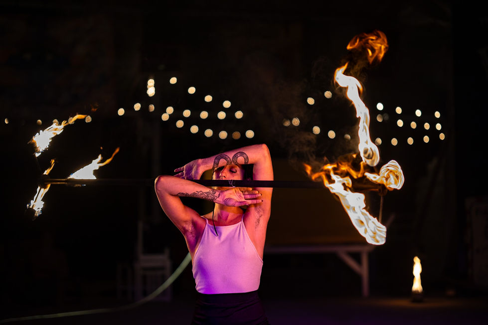 Fire girl dragon staff play fire performing dance female