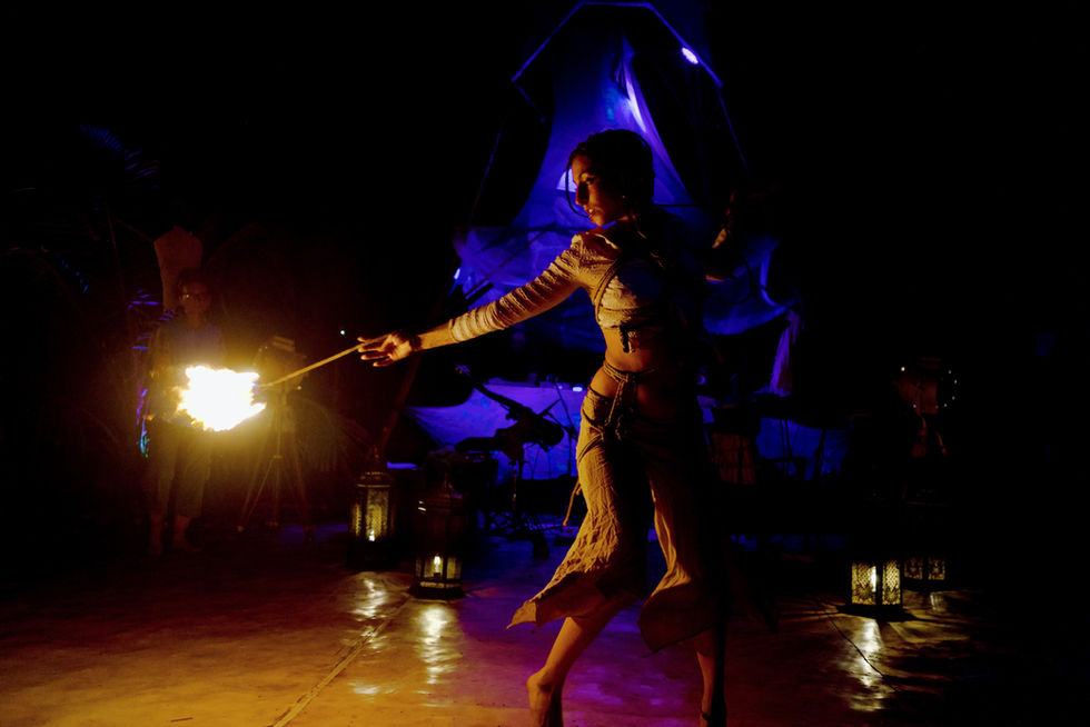 Fire spinning girl and Shibari Ropes