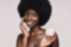 portrait-beautiful-young-african-woman-moisturizing-face-cream-smiling.jpg