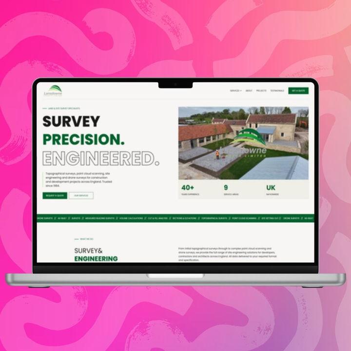 Lansdowne Surveys website homepage displayed on a laptop screen, designed by The Wix Guys