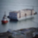 tug-boat-mercia-pulls-the-bibby-stockholm-accommodation-barge-into-portland-in-d-.jpg