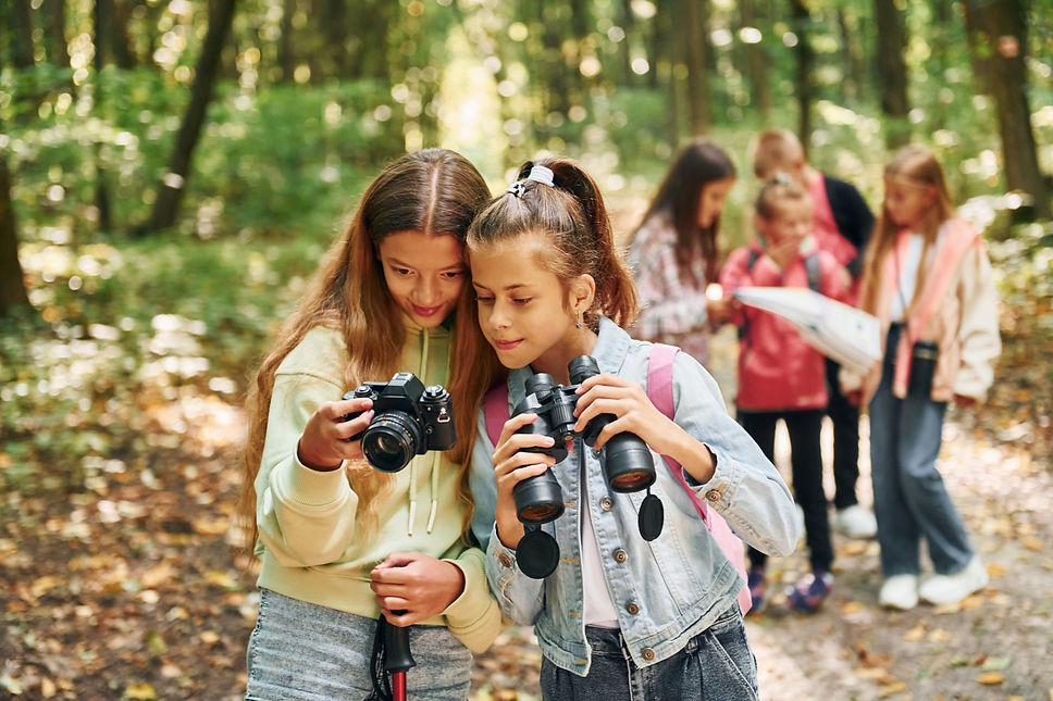 conception-of-tourism-kids-in-green-forest-at-sum-2021-12-23-00-47-39-utc.jpg