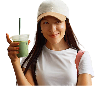 Woman holding an iced matcha latte for lifestyle and social media content
