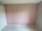 Newly gib-stopped wall with plaster finishing coat awaiting paint