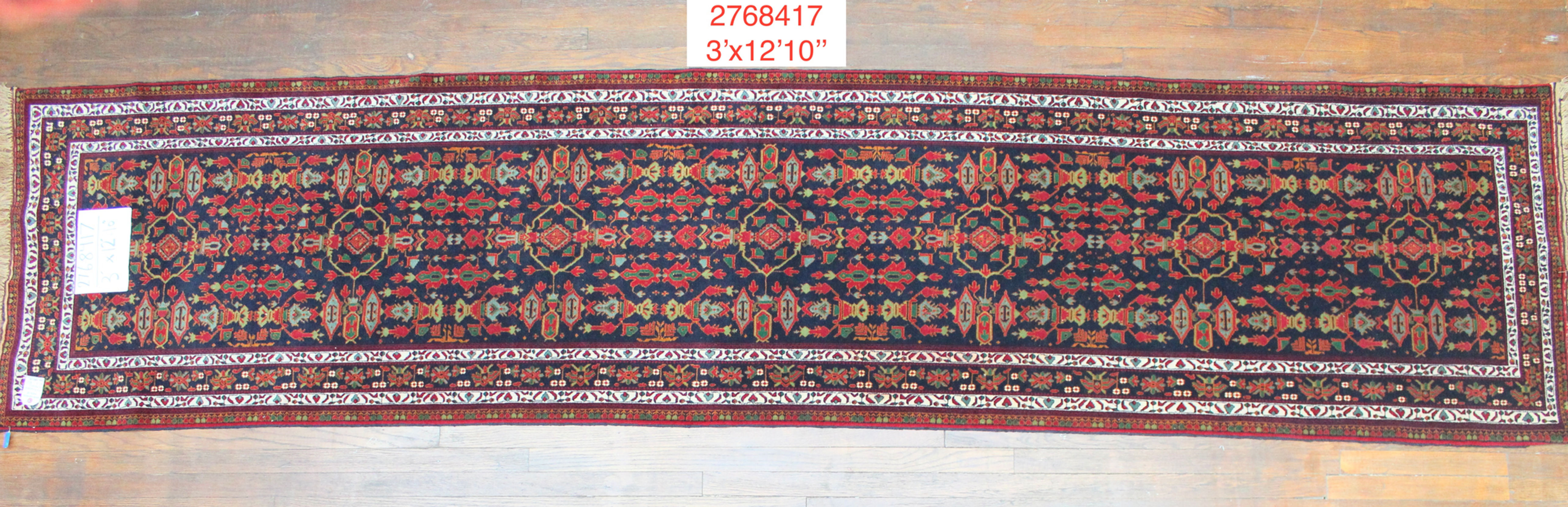 Fine Oriental Hand-made Rug (#2768417)