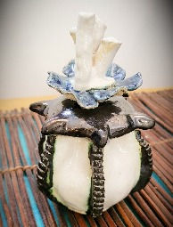 Coral sculpted ceramic jar with lid