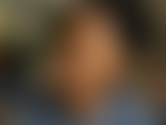 A child leaning toward possibility—the quiet, everyday practice of hope in a classroom that believes in her becoming.