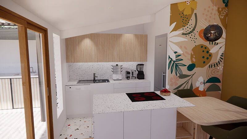 Cuisine moderne avec îlot central dans une case Tomi rénovée à Sainte-Suzanne, projet de rénovation à La Réunion par architecte d’intérieur