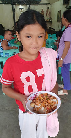 Child receiving nutritious meal