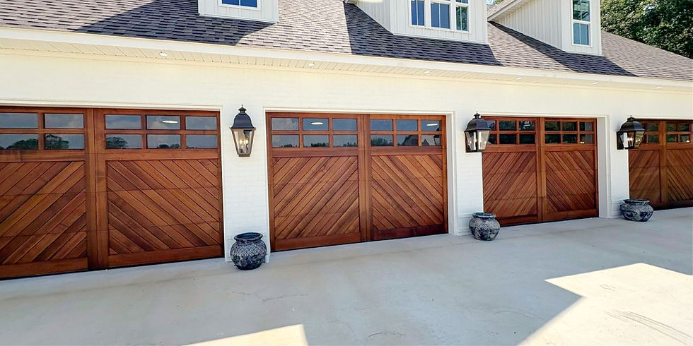 Custom Wood Garage Doors Chevron installed with Liftmaster Smart openers in Waynesboro, MS.