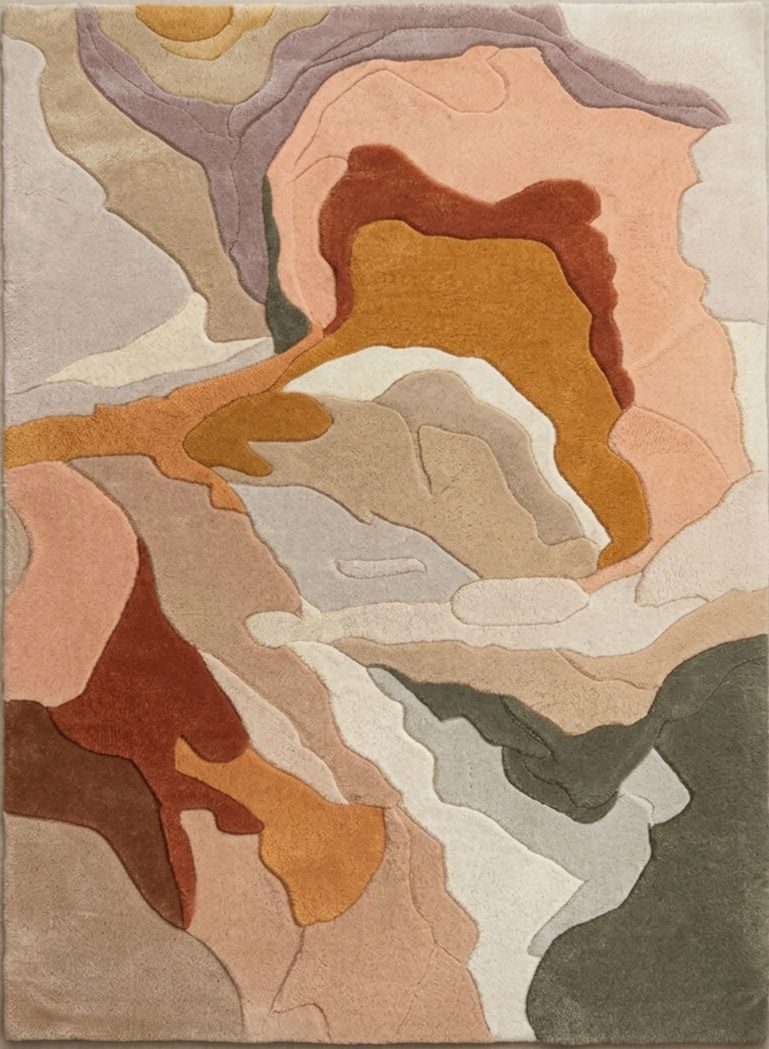 Overhead view of a hand tufted abstract topographic wool rug featuring colorful, layered earth tone waves.