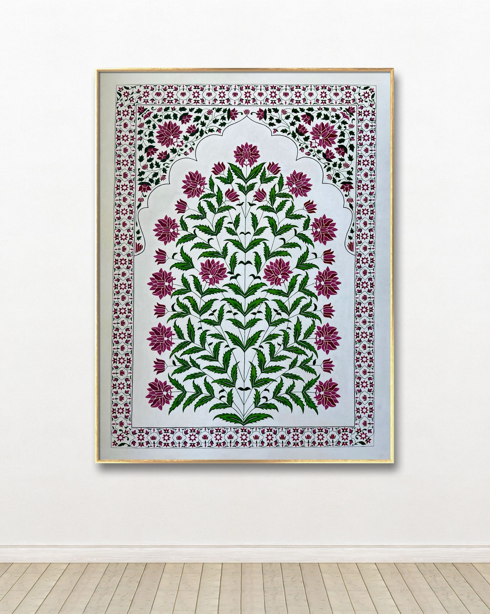Indian Mughal Floral Art painting with a symmetrical magenta floral tree inside a decorative border archway.