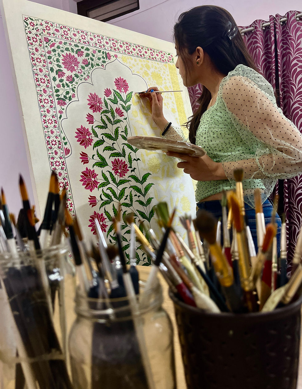 Thumbnail: Indian Mughal Floral Art painting with a symmetrical magenta floral tree inside a decorative border archway.
