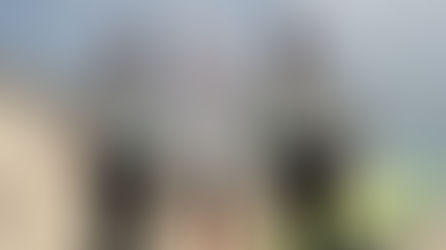 Is Cabo safe is an often-asked question. An American tourist poses on the beach in Cabo San Lucas with two officers from the Mexico police force who are patrolling the beach.